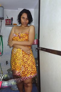 Lily in yellow sexy cholie getting naked for shower