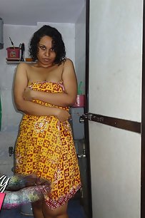 Lily in yellow sexy cholie getting naked for shower